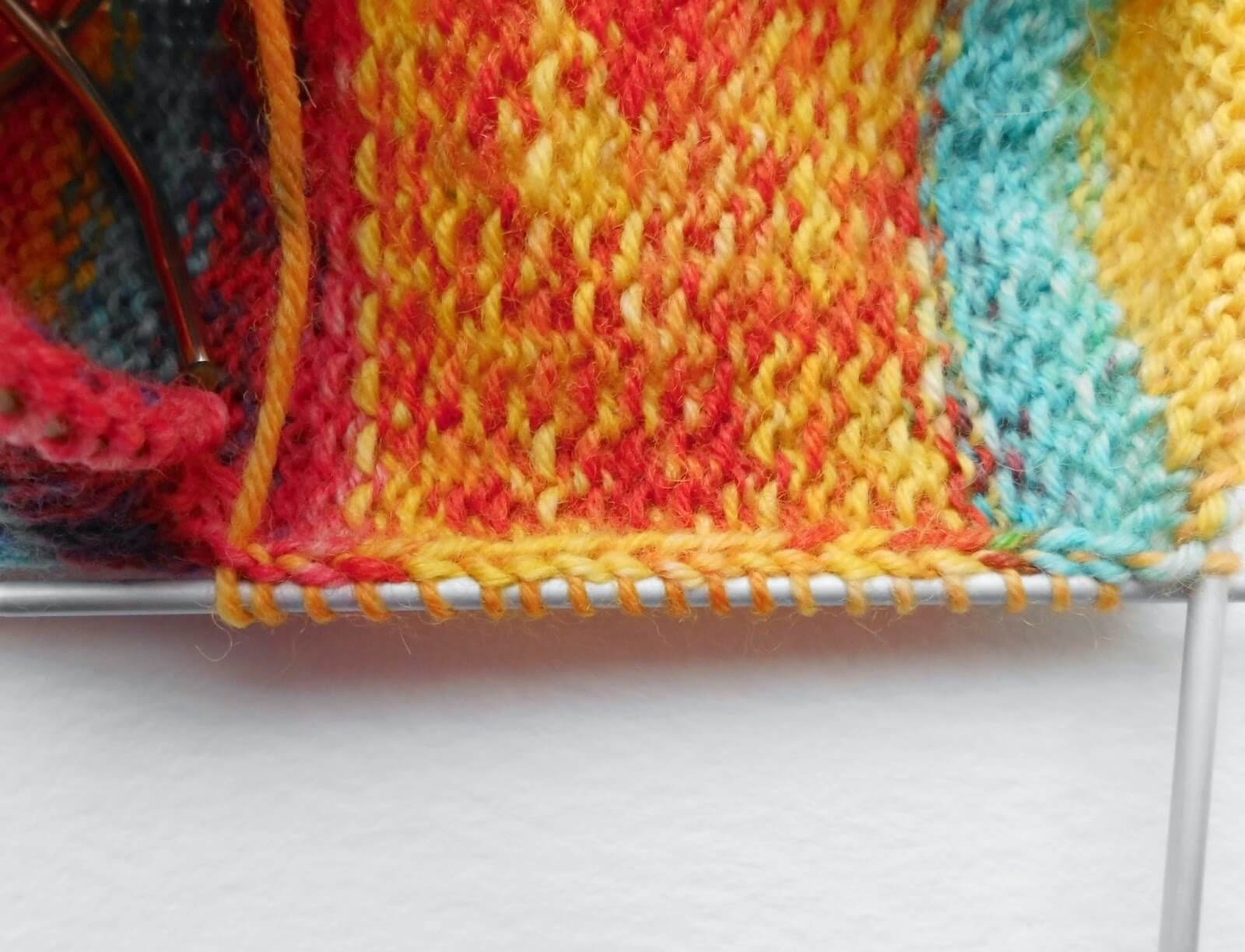 Sock knitting for beginners: picked up gusset stitches