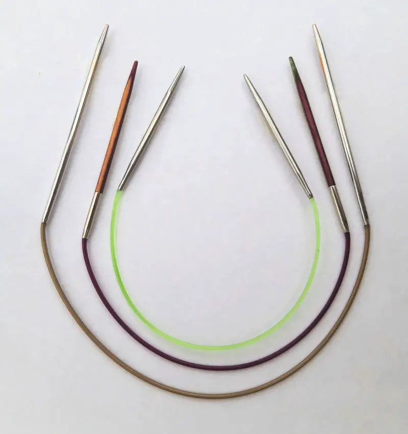 Use a pair of circular knitting needles to create round knit work.