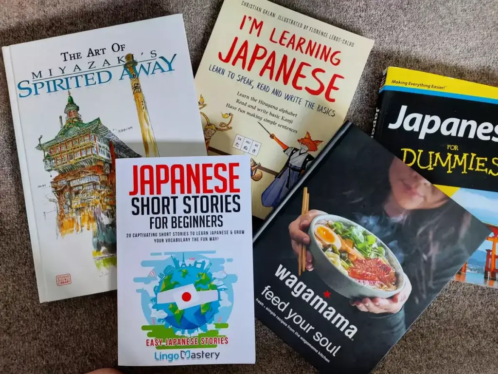 A selection of Japanese books - learning the language, the art of Spirited Away and a Wagamama cook book 