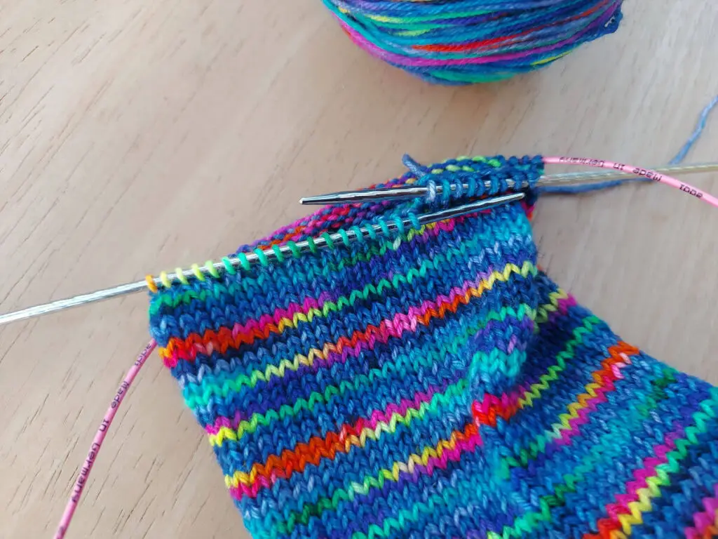 Premium Photo  Knitting needles typed loops on hosiery knitting needles  circular knitting and yarn