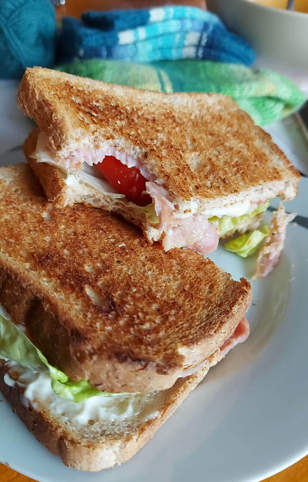 A bacon, lettuce and tomato sandwich on toasted bread