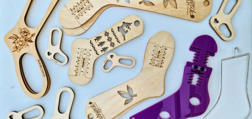 A selection of sock blockers made of wood, acrylic and wire are displayed on a white background