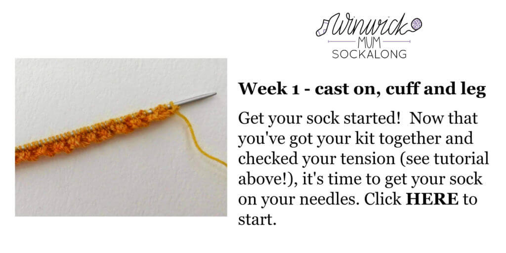 A double pointed needle with rows of knitted rib in orange yarn