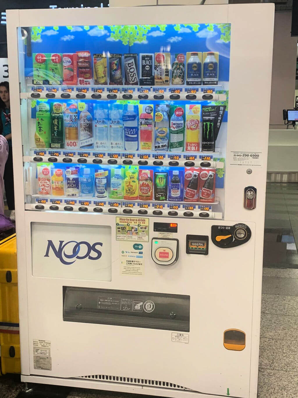 A vending machine containing drinks