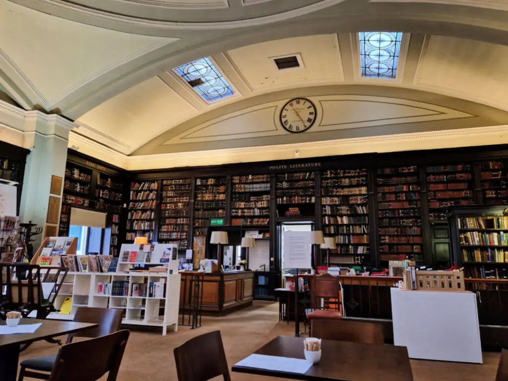 The interior of a small library with a portico ceiling