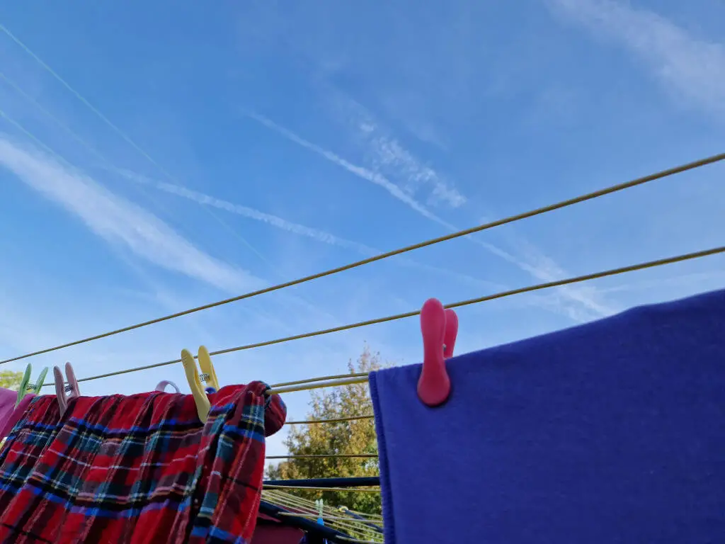 Blue sky above washing on a line