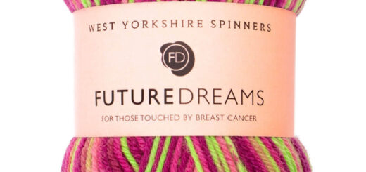 A ball of yarn in shades of pink and neon green