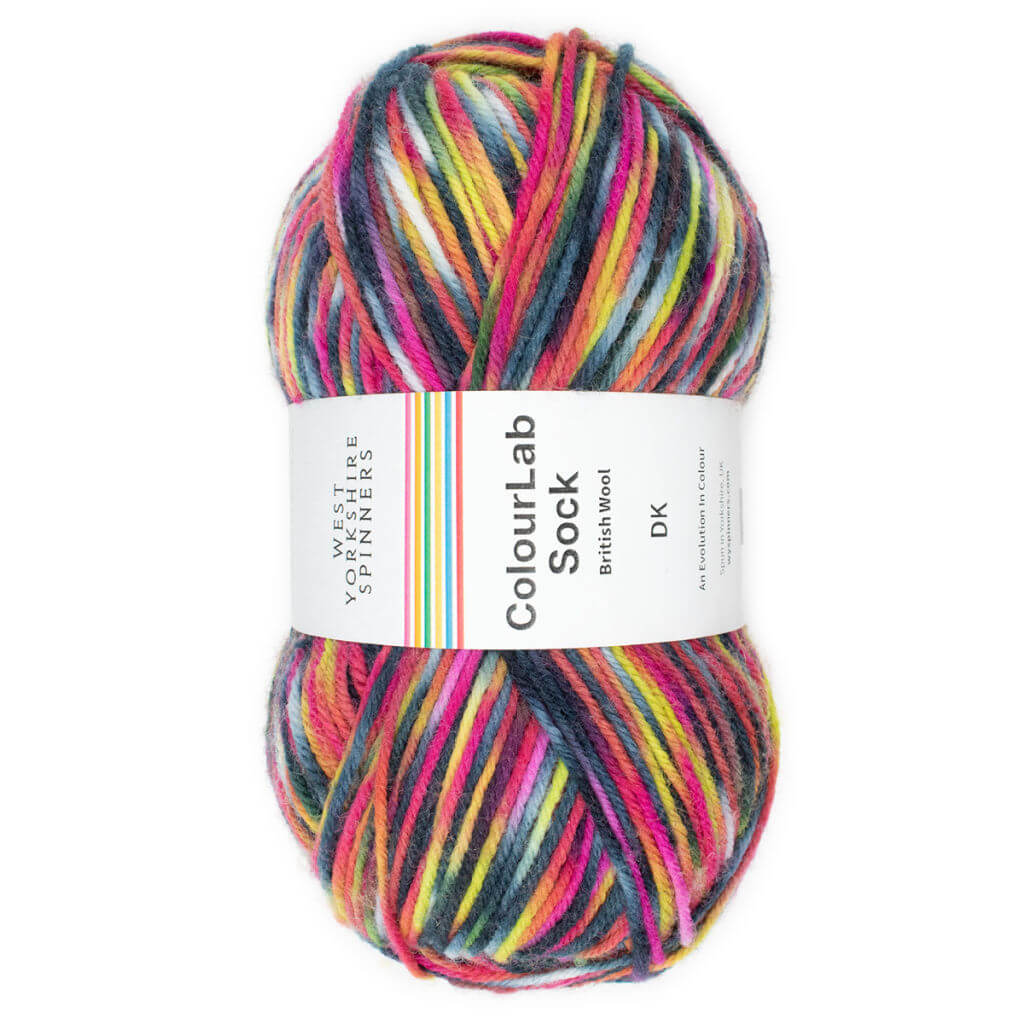 A single ball of yarn in shades of red, black, yellow and orange with a ball band describing it as ColourLab Sock
