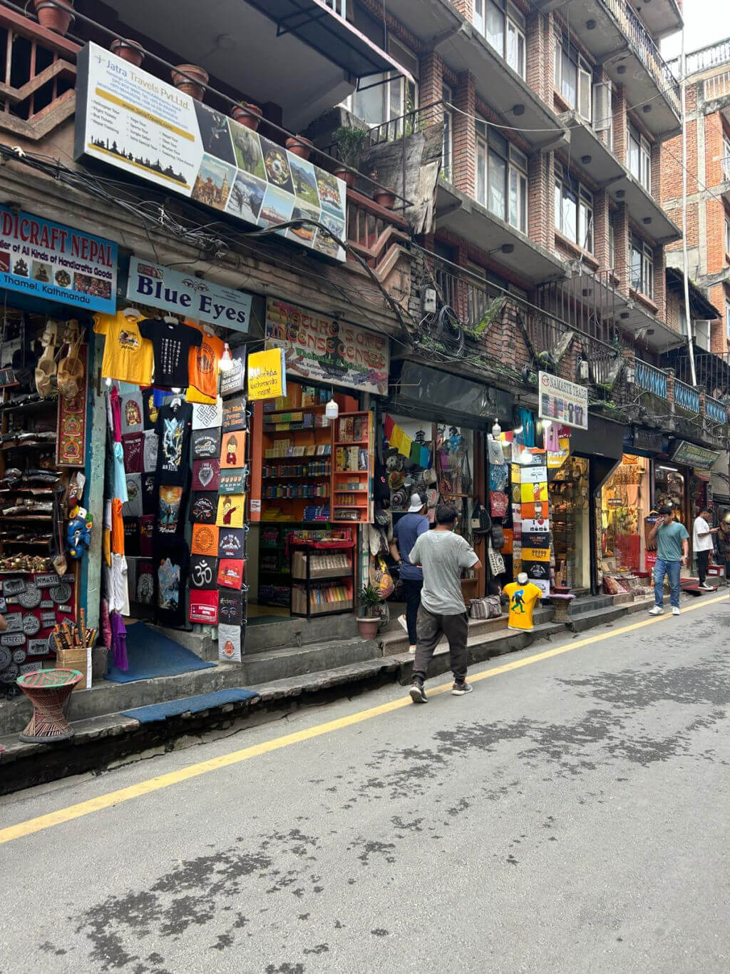 Shops with wares displayed outside in a street
