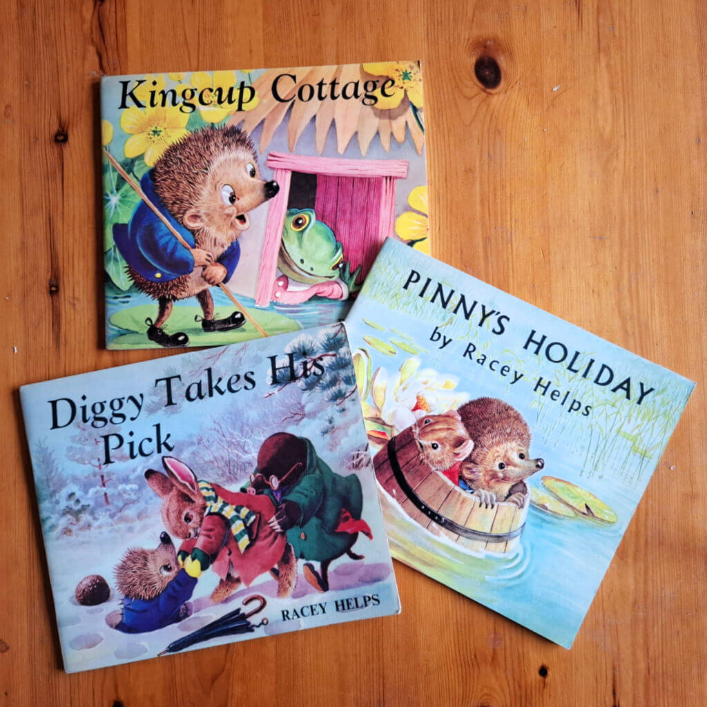 Three children's story books featuring a hedgehog and other animals wearing clothes