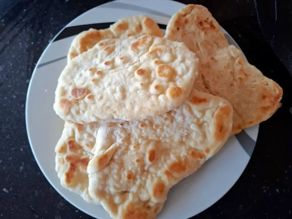 A plate of cooked flatbreads