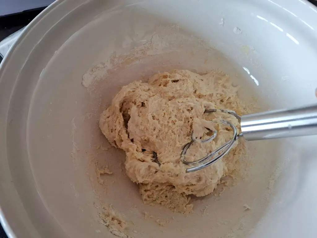 Dough mixed to a sticky consistency with a hand whisk