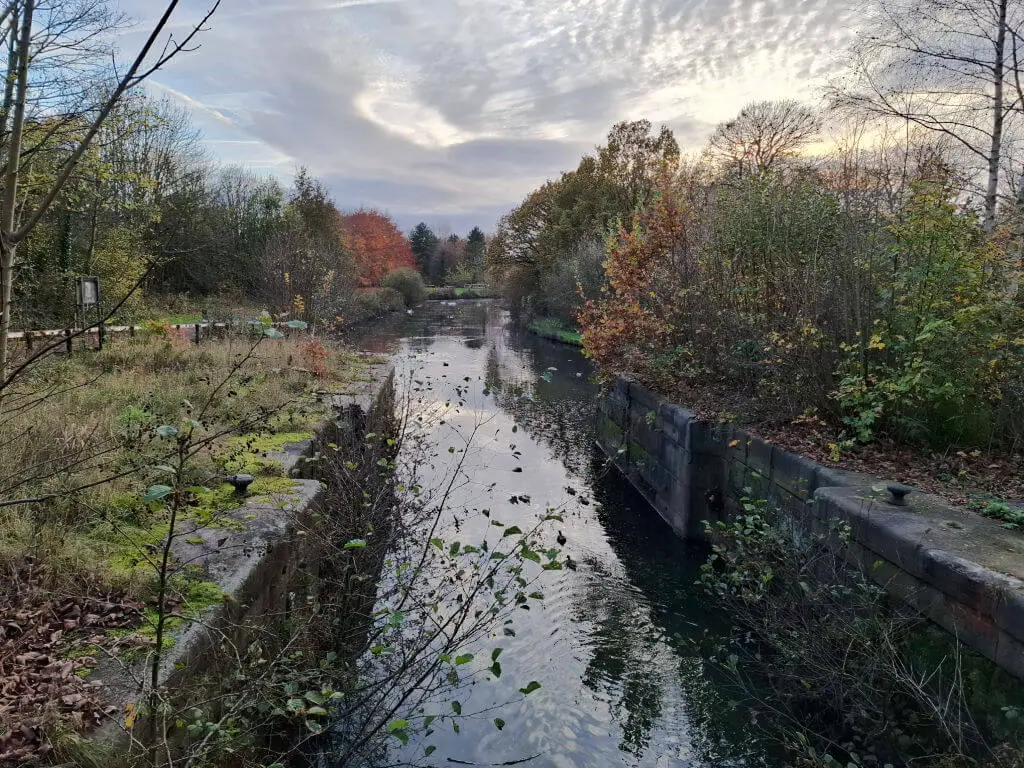 A view from a bridge down a canal