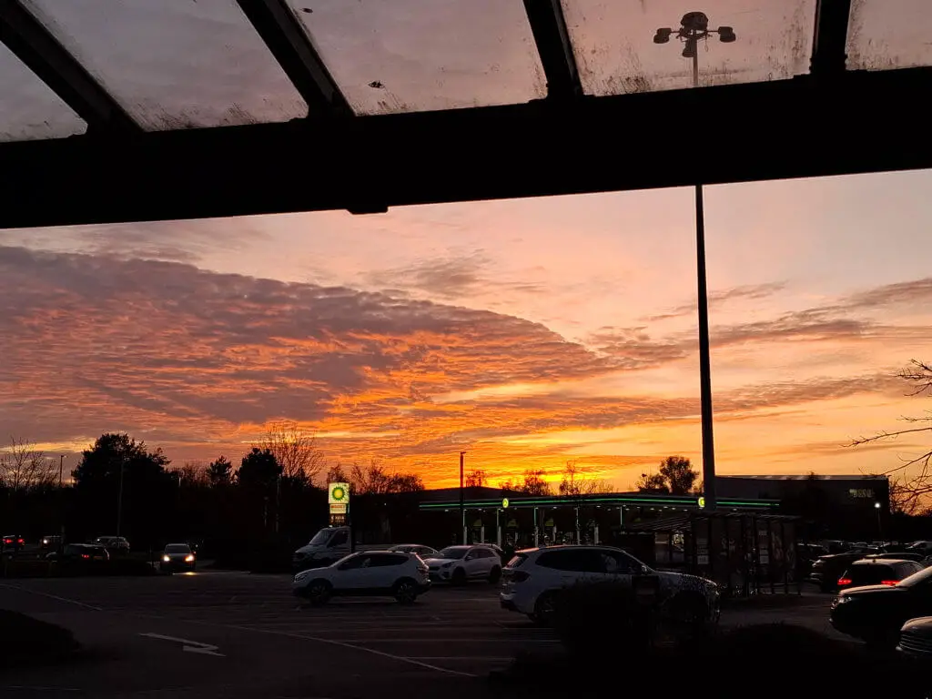 A sunset view taken from a shopping centre car park