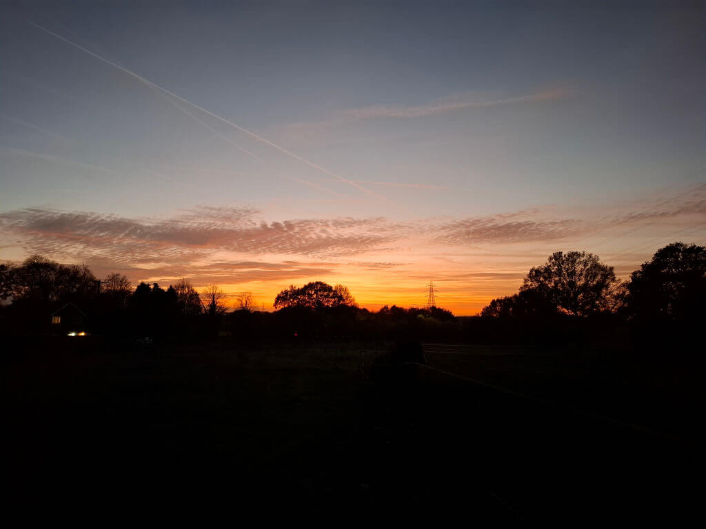 A sunset across fields