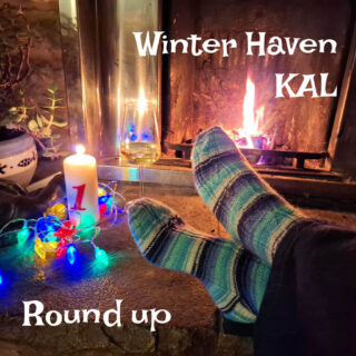 Cozy scene of socked feet by a fireplace, with a candle, a glass of wine, and colorful lights. Text reads "Winter Haven KAL Round up." Warm and relaxing atmosphere.
