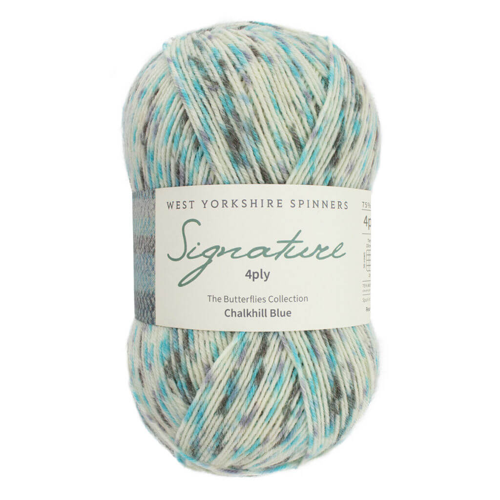 Skein of yarn in soft blue, gray, and cream hues, with a label reading "West Yorkshire Spinners, Signature 4ply, Chalkhill Blue." Calm and textured.
